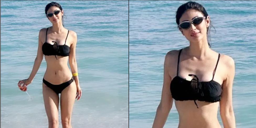 ब्लैक बिकिनी में तस्वींर शेयर कर ट्रोल हुईं मॉनी रॉय, कहा क्या कोई इसे कुछ खाना खिला सकता है